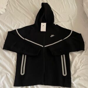 NIKE TECH REFLECTIVE HOODIE
SIZE MEDIUM FITS SMALL